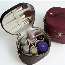 Load image into Gallery viewer, Oval Toiletry Bag - Tan

