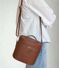 Load image into Gallery viewer, Oval Toiletry Bag - Tan
